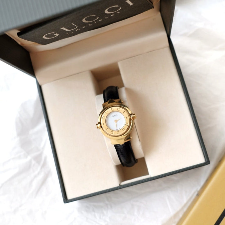 Gucci vintage gold swivel-twirl wristwatch