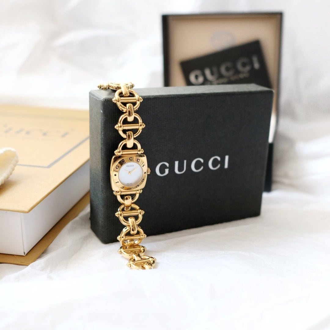 Gucci vintage 6400L mother pearl dial & horsebit chain watch