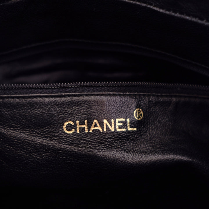 Chanel black quilted lambskin crossbody bag with tassel