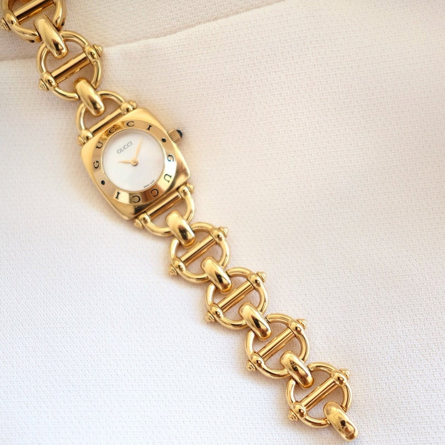 Gucci vintage 6400L mother pearl dial & horsebit chain watch