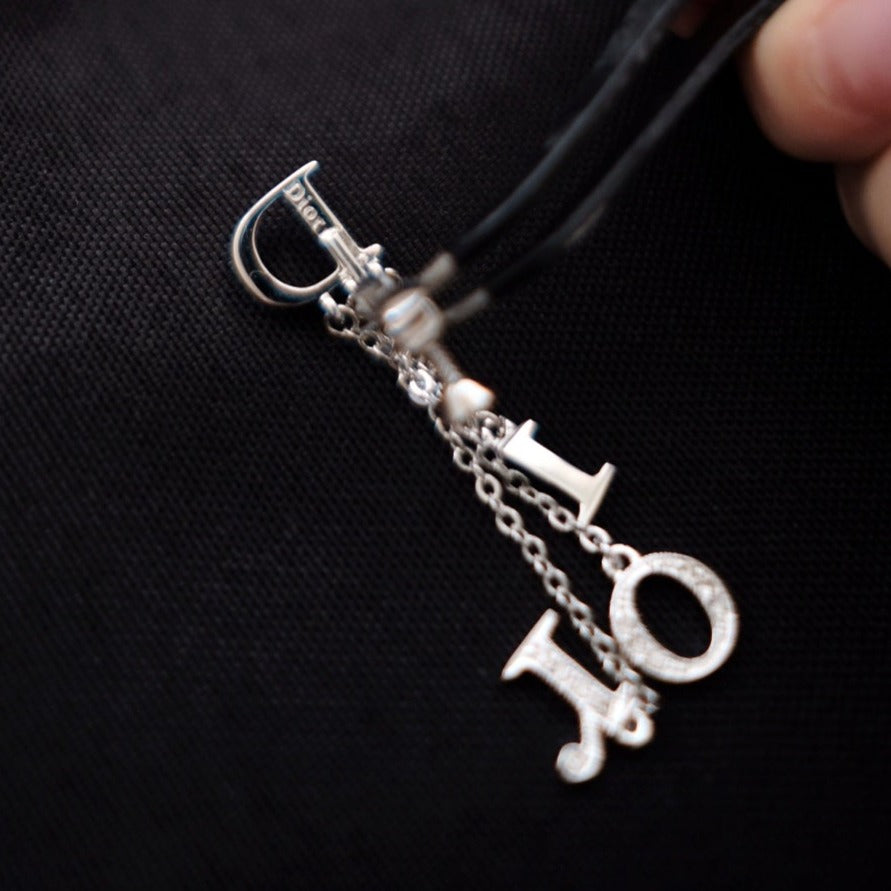 Dior vintage logo dangle earrings