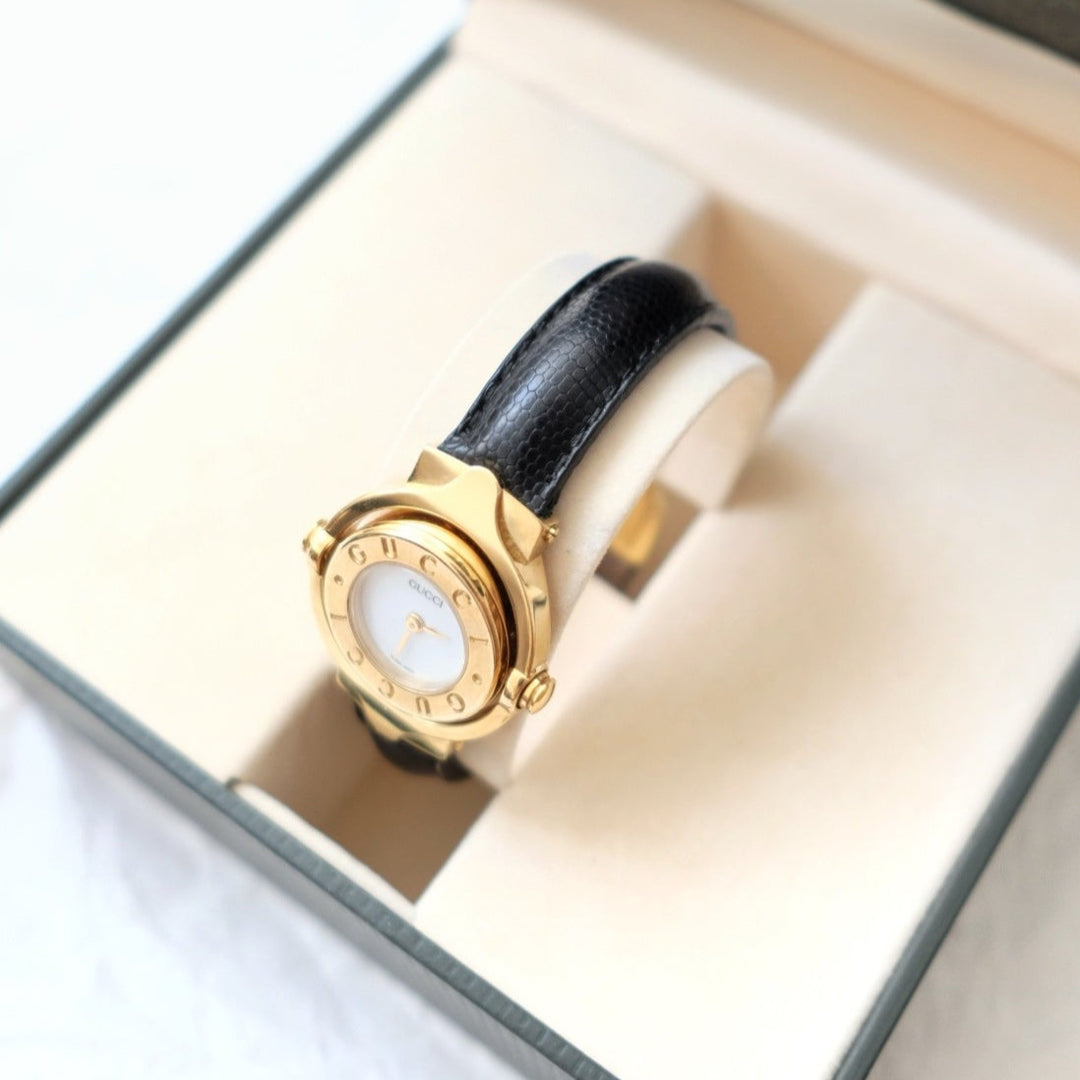 Gucci vintage gold swivel-twirl wristwatch