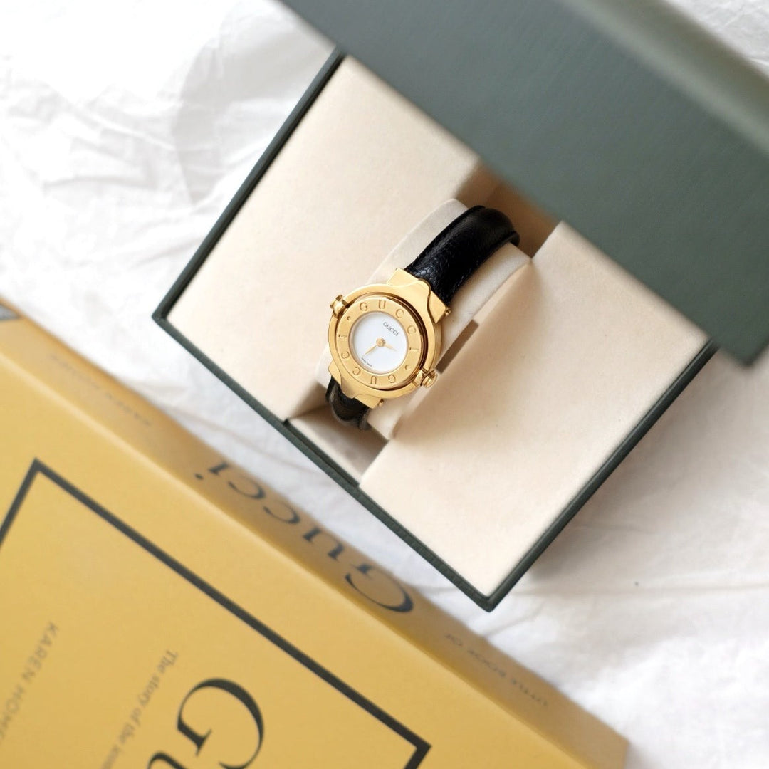 Gucci vintage gold swivel-twirl wristwatch