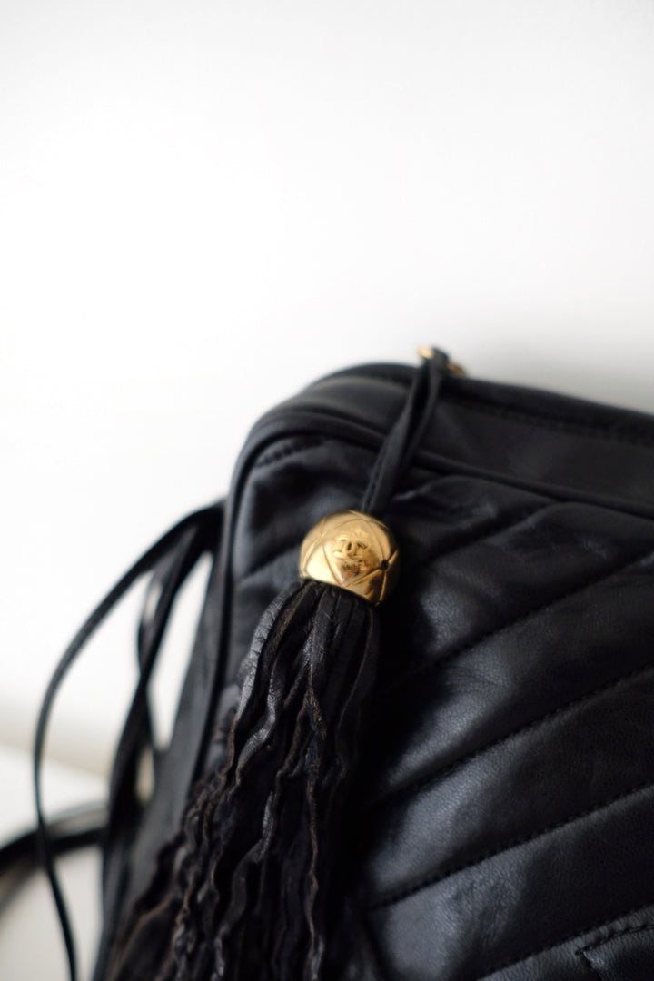 Chanel black quilted lambskin crossbody bag with tassel