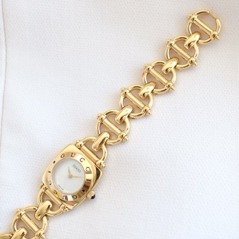 Gucci vintage 6400L mother pearl dial & horsebit chain watch