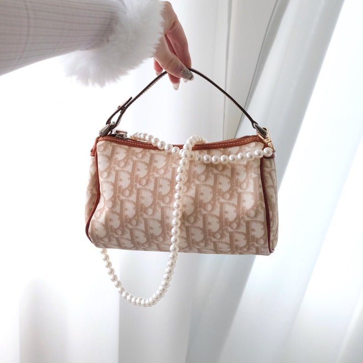 Dior vintage pouchette beige leather baguette