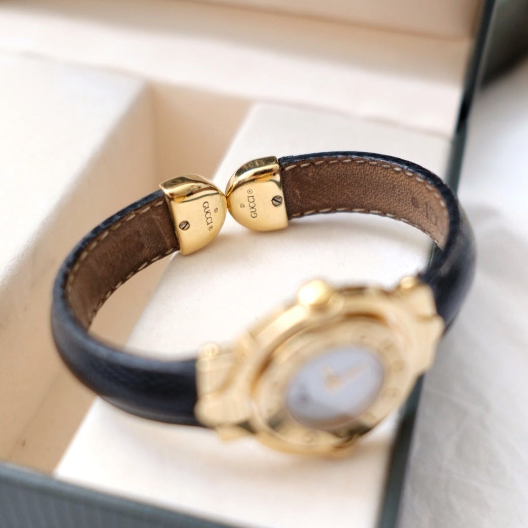 Gucci vintage gold swivel-twirl wristwatch