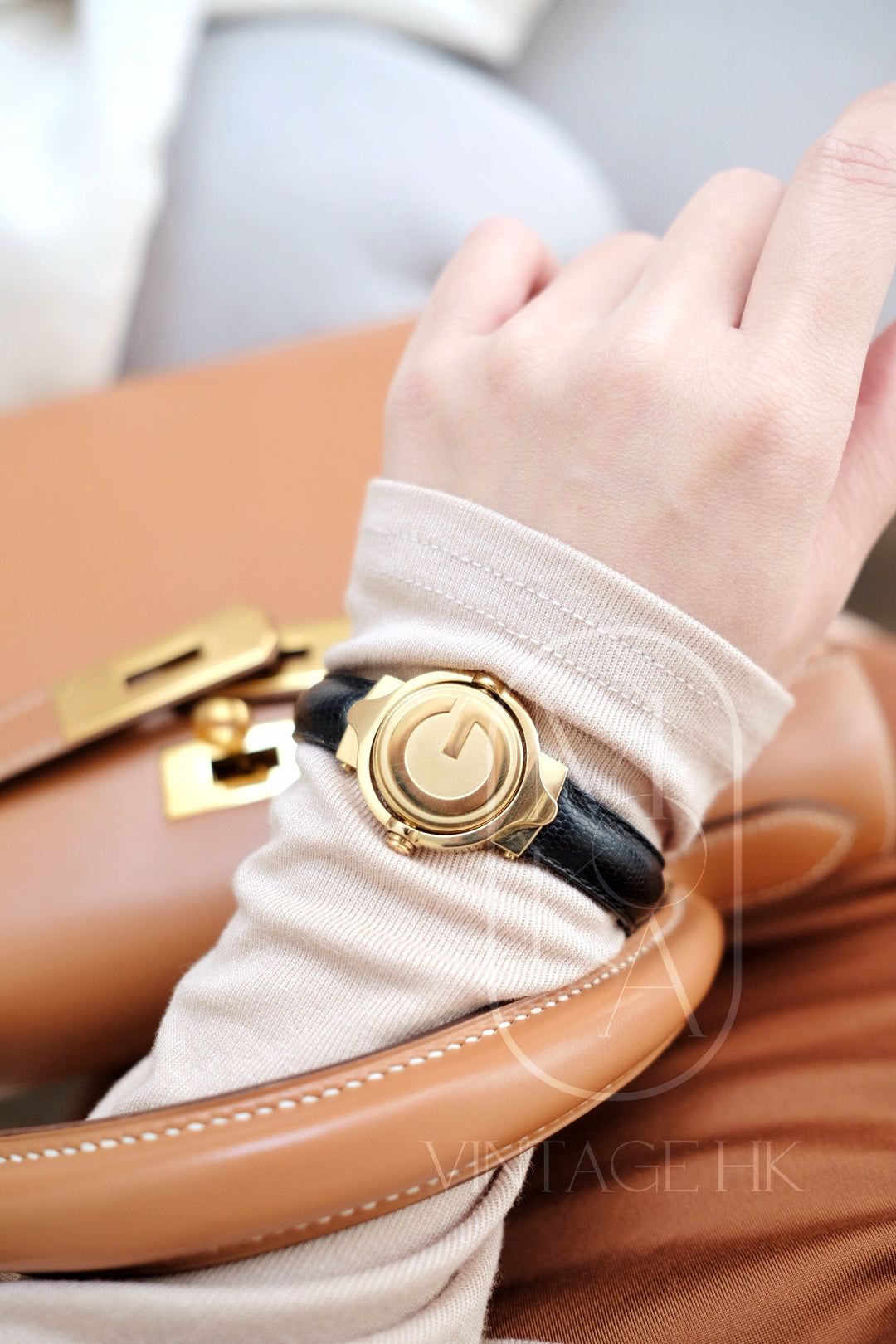 Gucci vintage gold swivel-twirl wristwatch