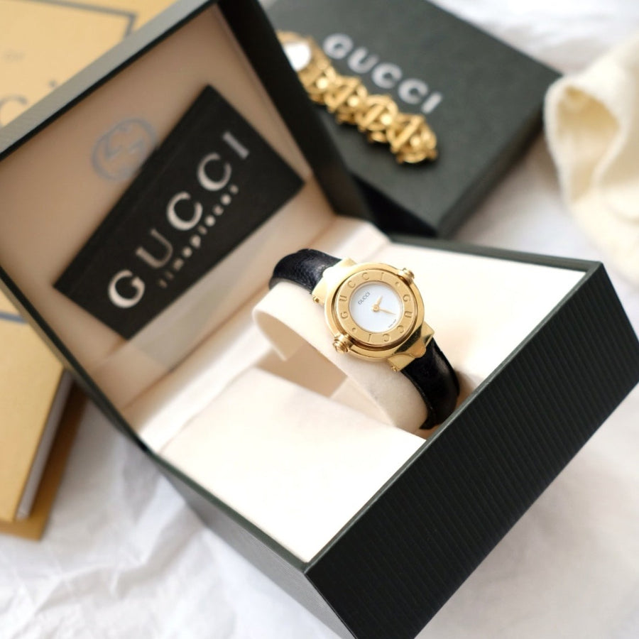 Gucci vintage gold swivel-twirl wristwatch