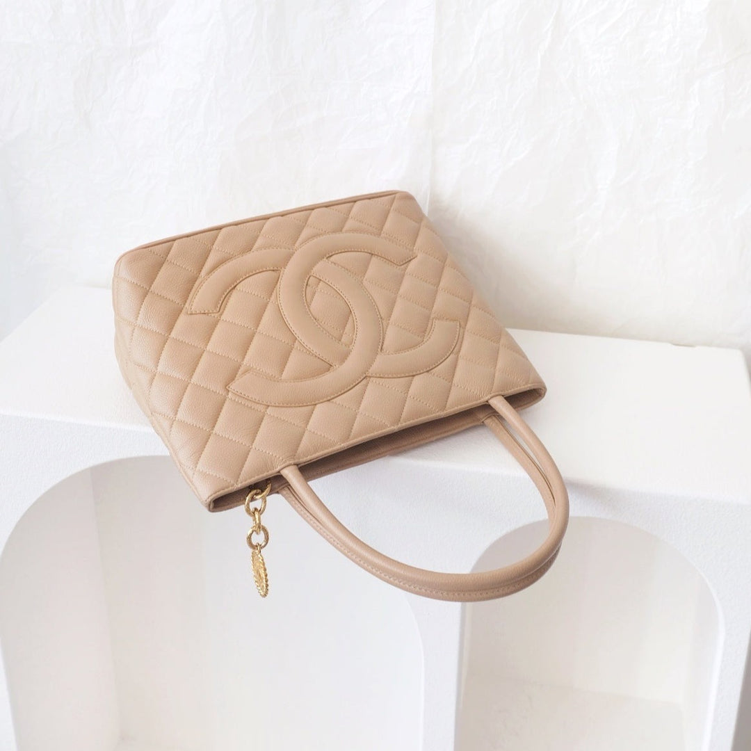 Chanel medallion beige tote bag