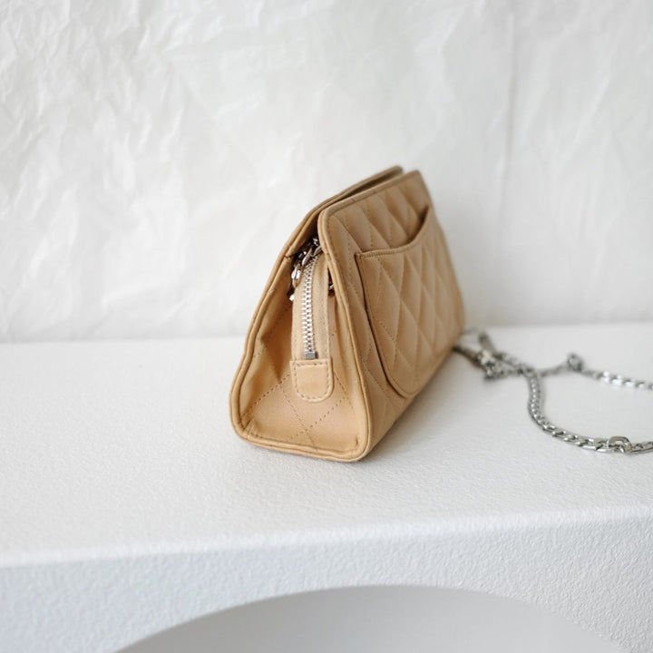 Chanel vintage beige quilted sheepskin pouch +chain