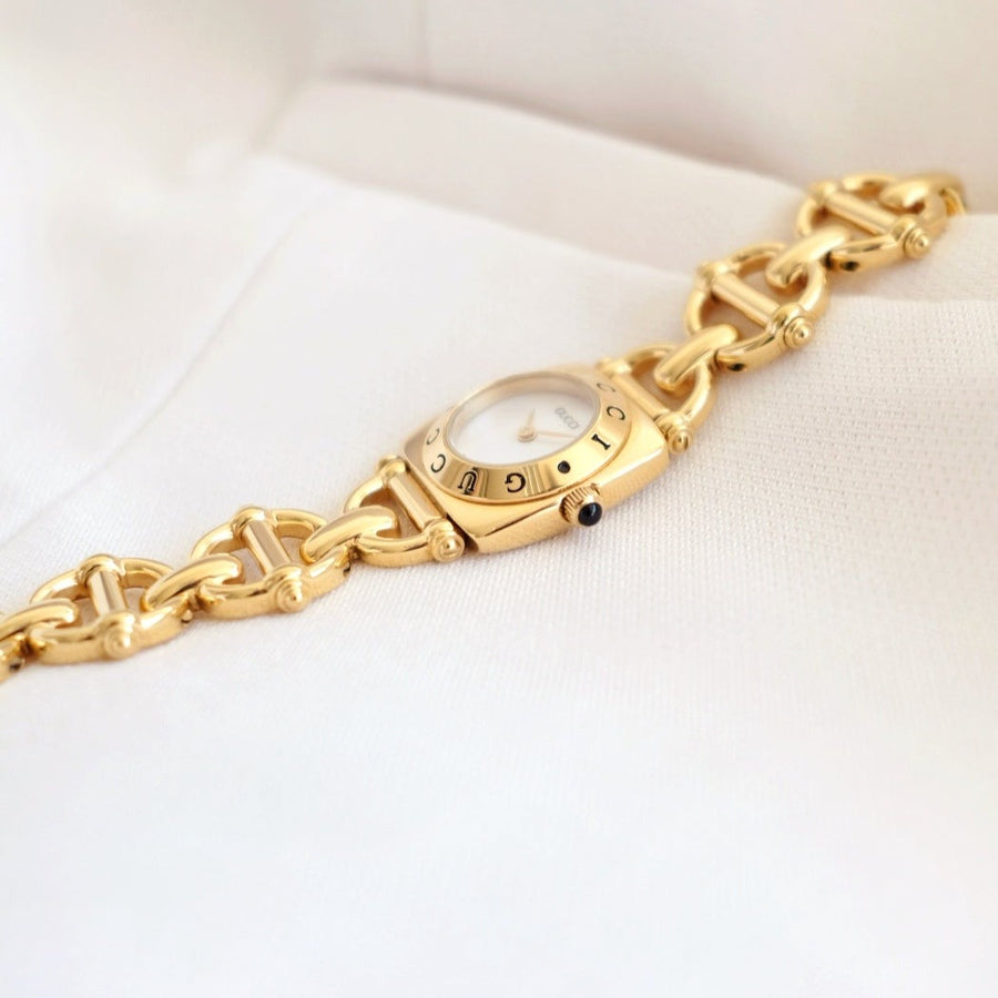Gucci vintage 6400L mother pearl dial & horsebit chain watch