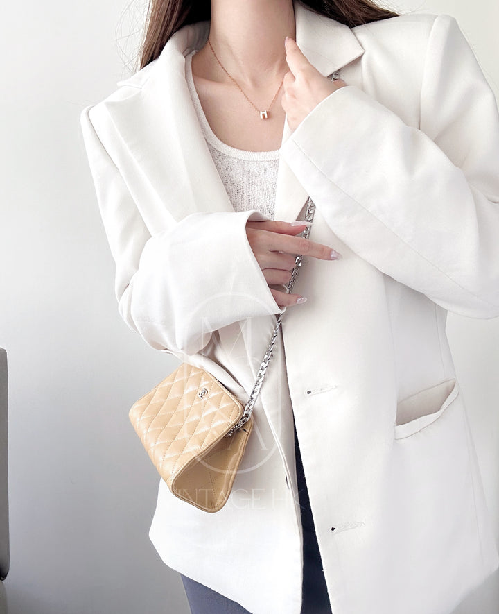 Chanel vintage beige quilted sheepskin pouch +chain