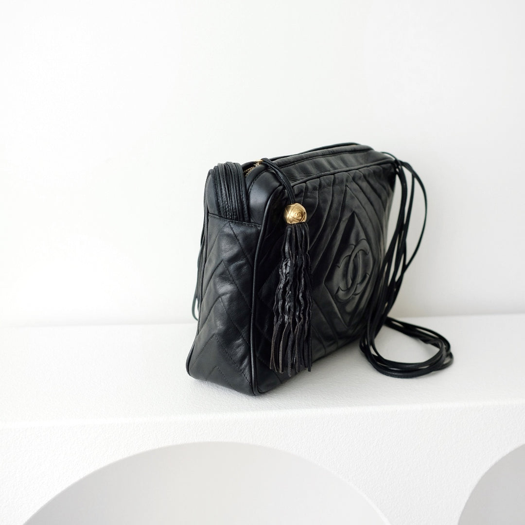 Chanel black quilted lambskin crossbody bag with tassel