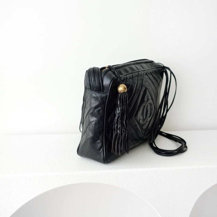 Chanel black quilted lambskin crossbody bag with tassel