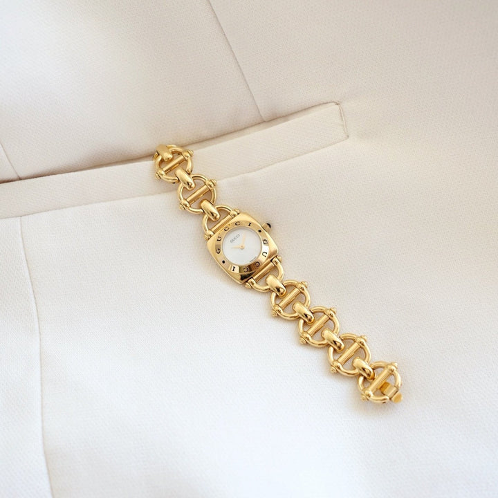 Gucci vintage 6400L mother pearl dial & horsebit chain watch