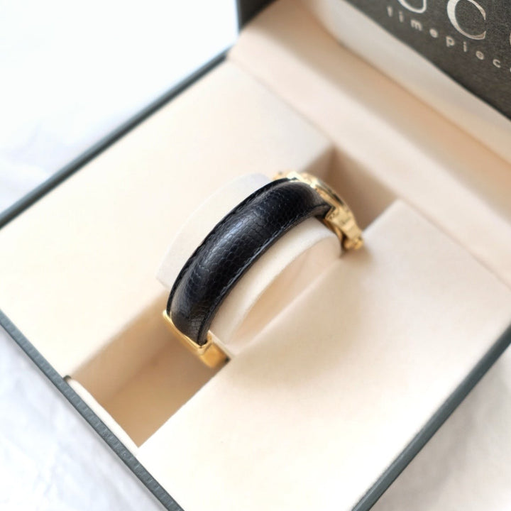 Gucci vintage gold swivel-twirl wristwatch