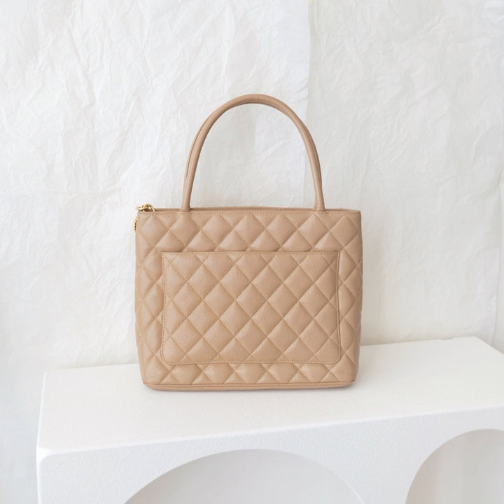 Chanel medallion beige tote bag