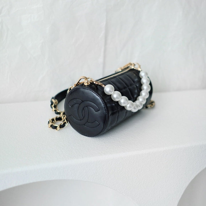 Chanel vintage chocolate bar cc cylinder bag