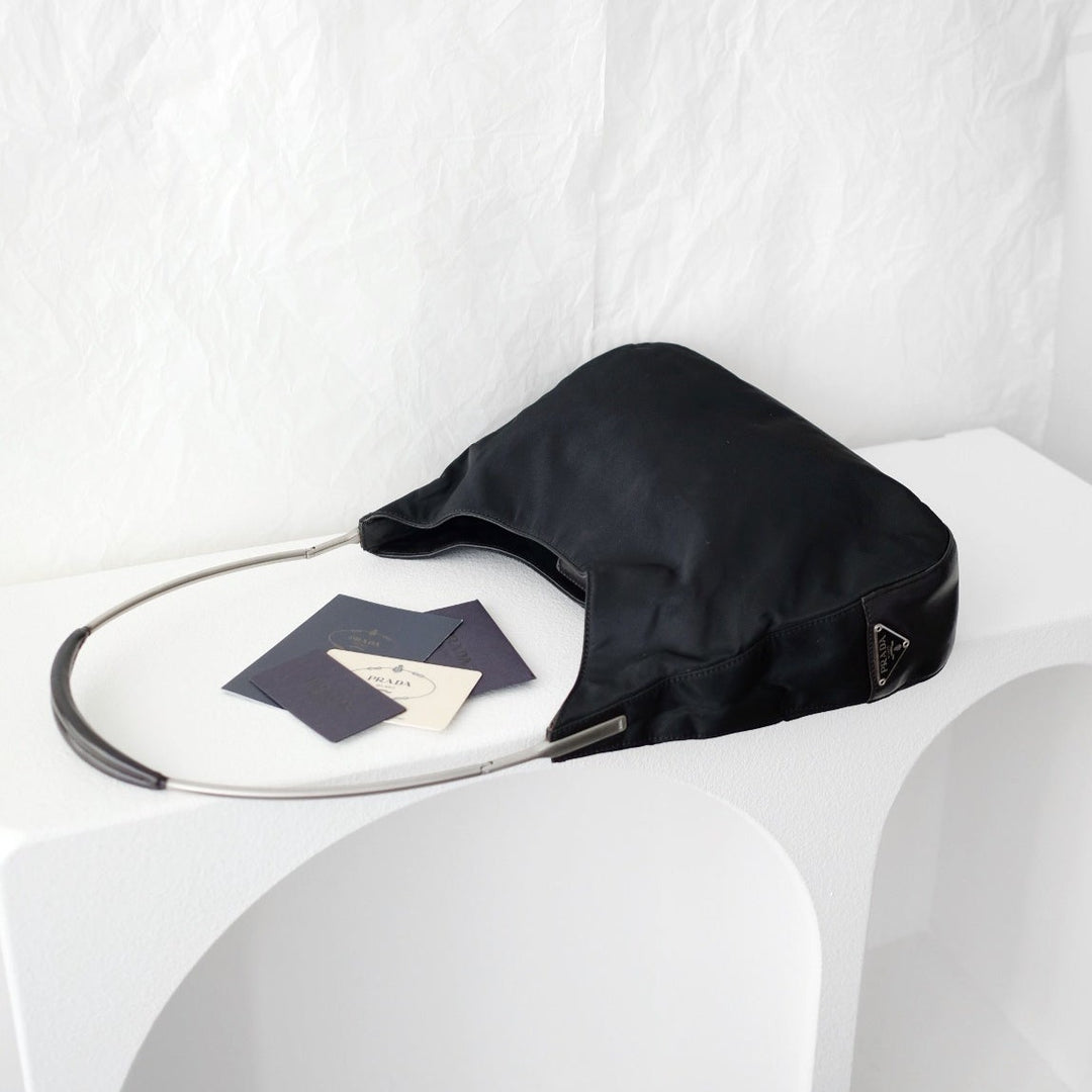 Prada metal strap side logo tote bag