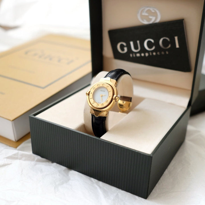 Gucci vintage gold swivel-twirl wristwatch