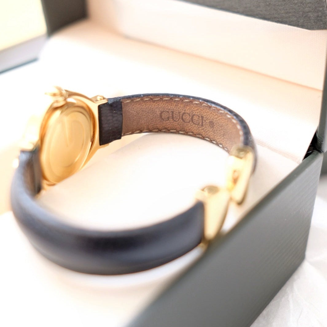 Gucci vintage gold swivel-twirl wristwatch