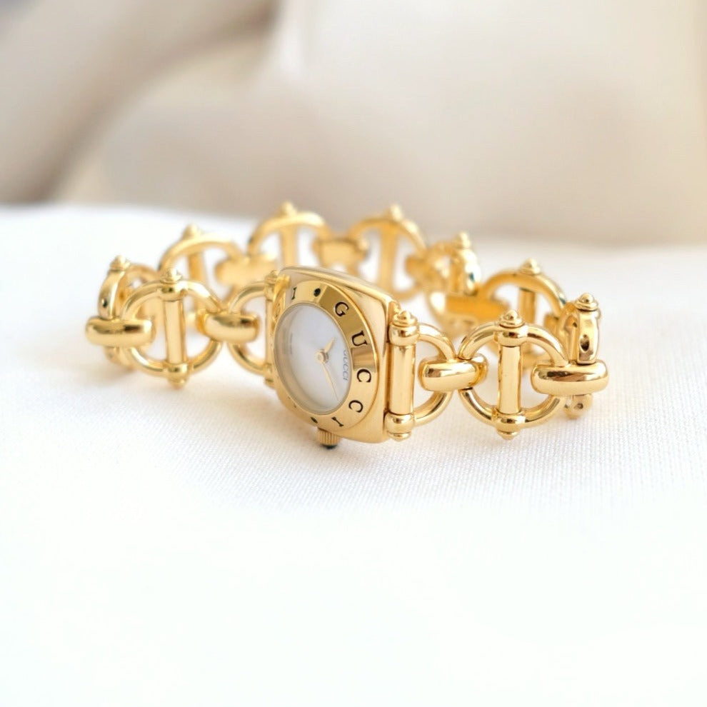 Gucci vintage 6400L mother pearl dial & horsebit chain watch