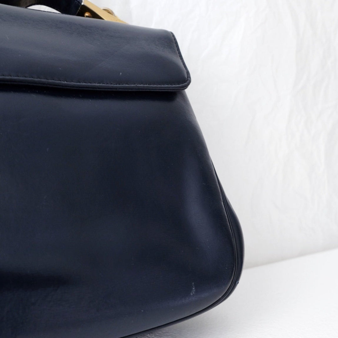 Dior trotteur dark navy cream leather jacquard handbag