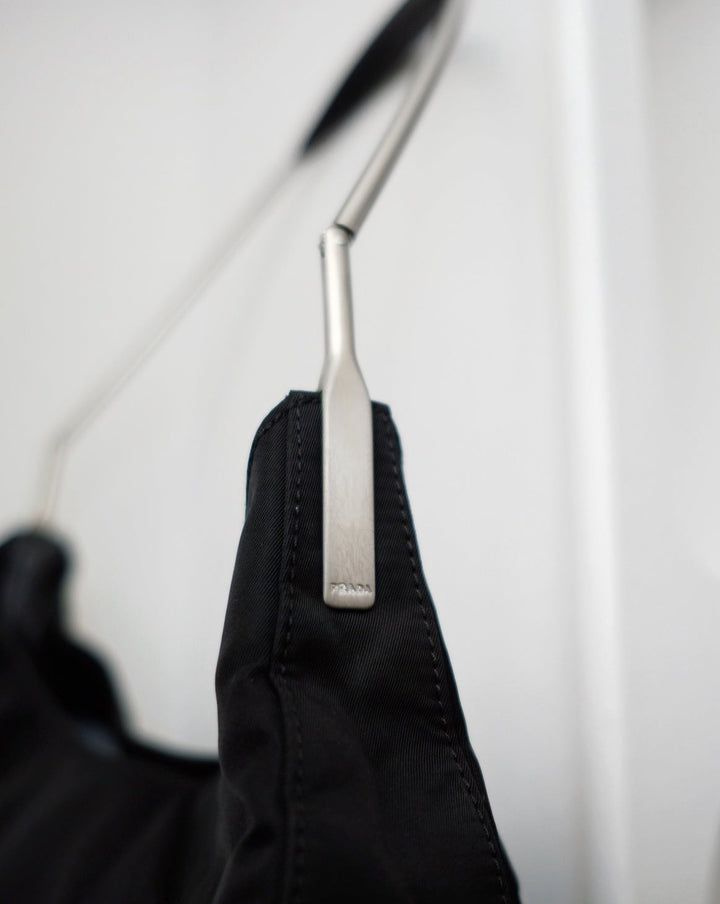 Prada metal strap side logo tote bag