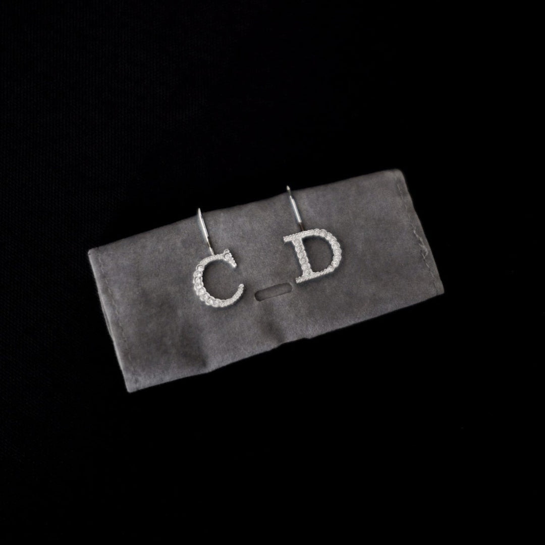 Dior silver CD earrings